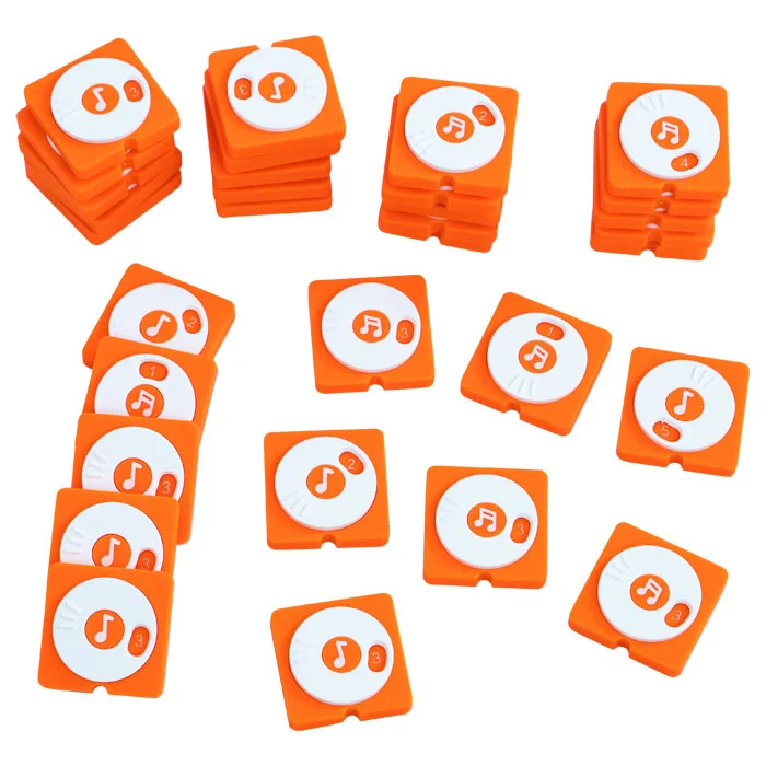 orange cubes, musical note, volume knob, stacked tiles, game pieces