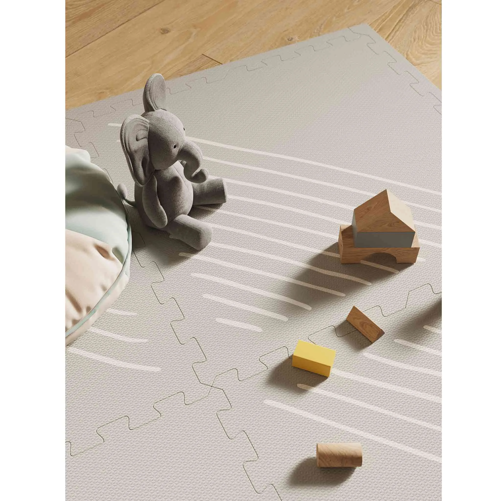 baby-playmat, foam-mat, soft-toy, wooden-blocks, gray-elephant-plush