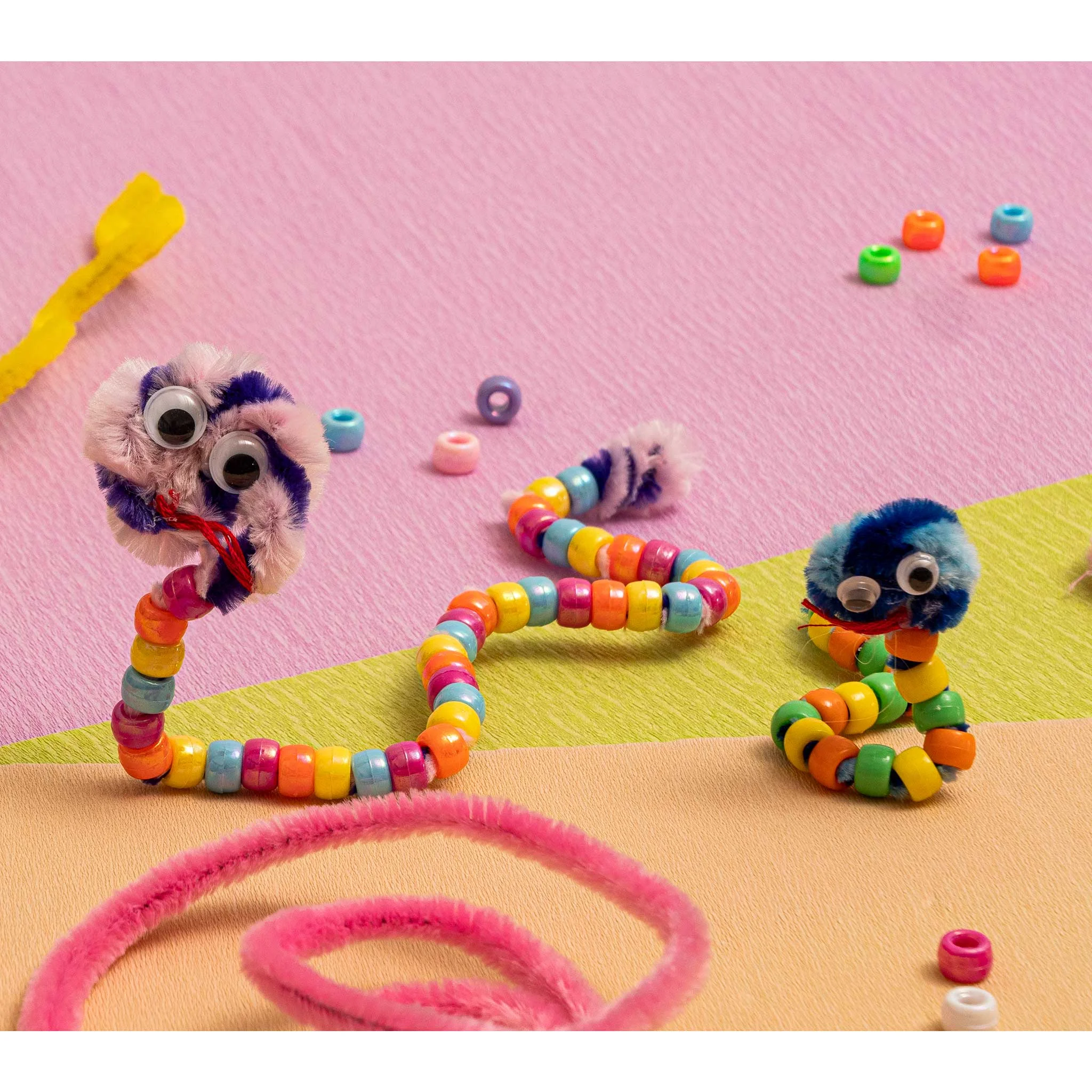 bead snake, bunte Perlenkette?, flauschiger Schlange?, wabbelnde Augen, bunte Perlen