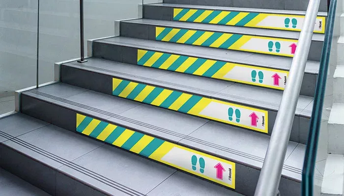 stair nosing, stair step, safety tape, yellow stripes, handrail