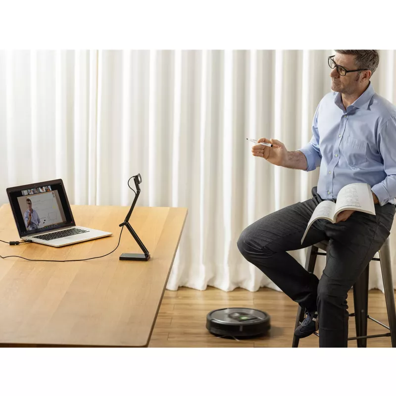 laptop, video call, whiteboard, book, robot vacuum